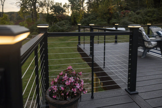 Deck with Keylink horizontal cable railing at sunset