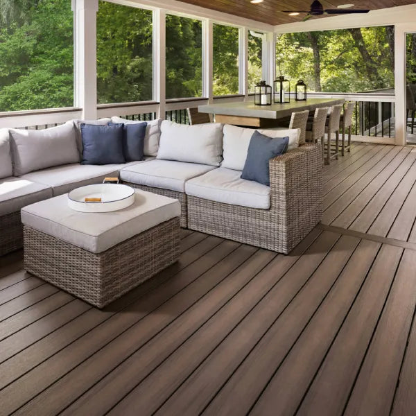 Screened-in patio featuring MoistureShield Elevate decking in a rich brown Riverbank finish