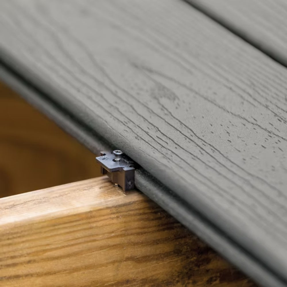 Trex Hideaway hidden fastener in the gap between gray deck boards