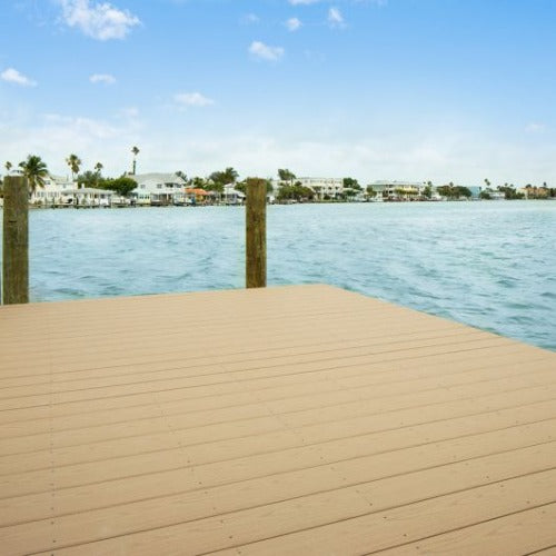 Waterfront dock with TimberTech Harvest Collection decking in Brownstone