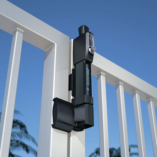 Black MagnaLatch installed on a white aluminum pool fence gate