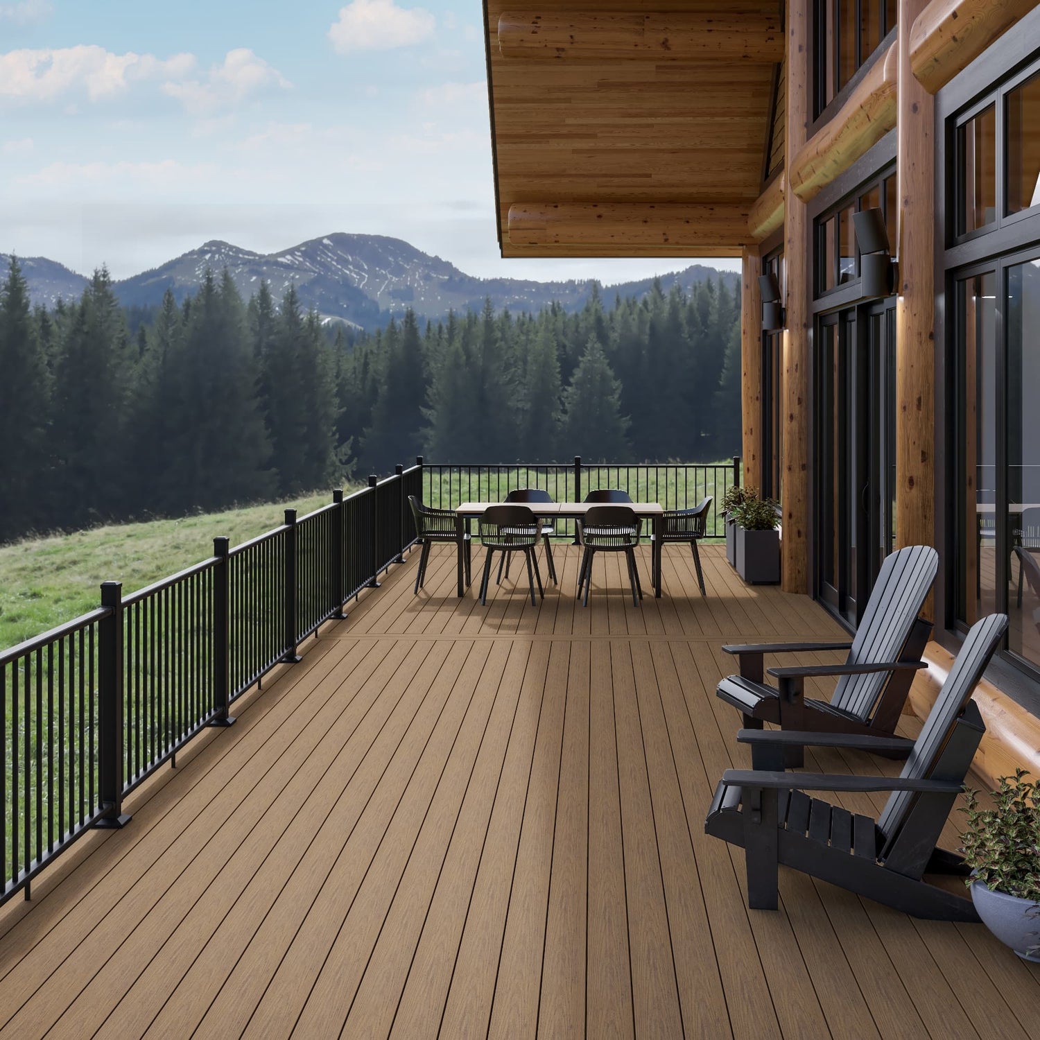 Wooden deck with chairs and a table, overlooking a scenic mountain landscape.