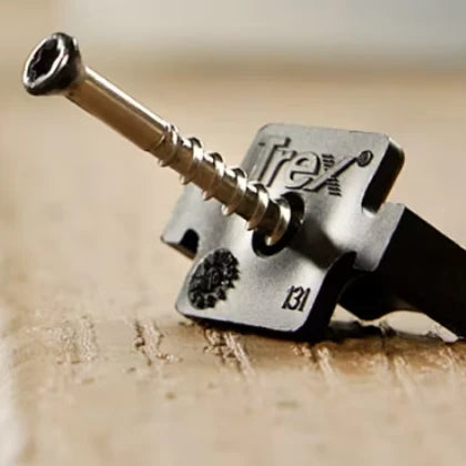 Close-up of a Trex hidden fastener clip with a screw.