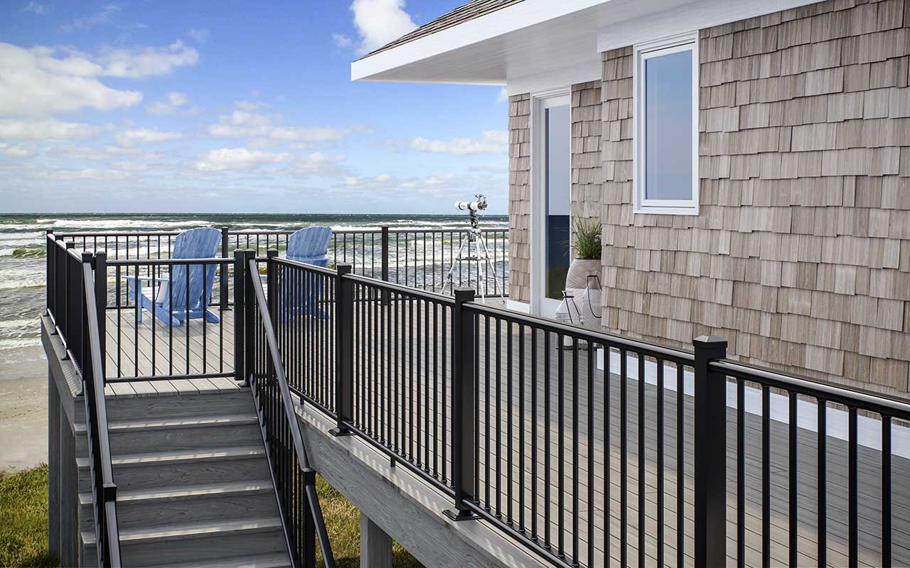 Beach house with a deck overlooking the ocean