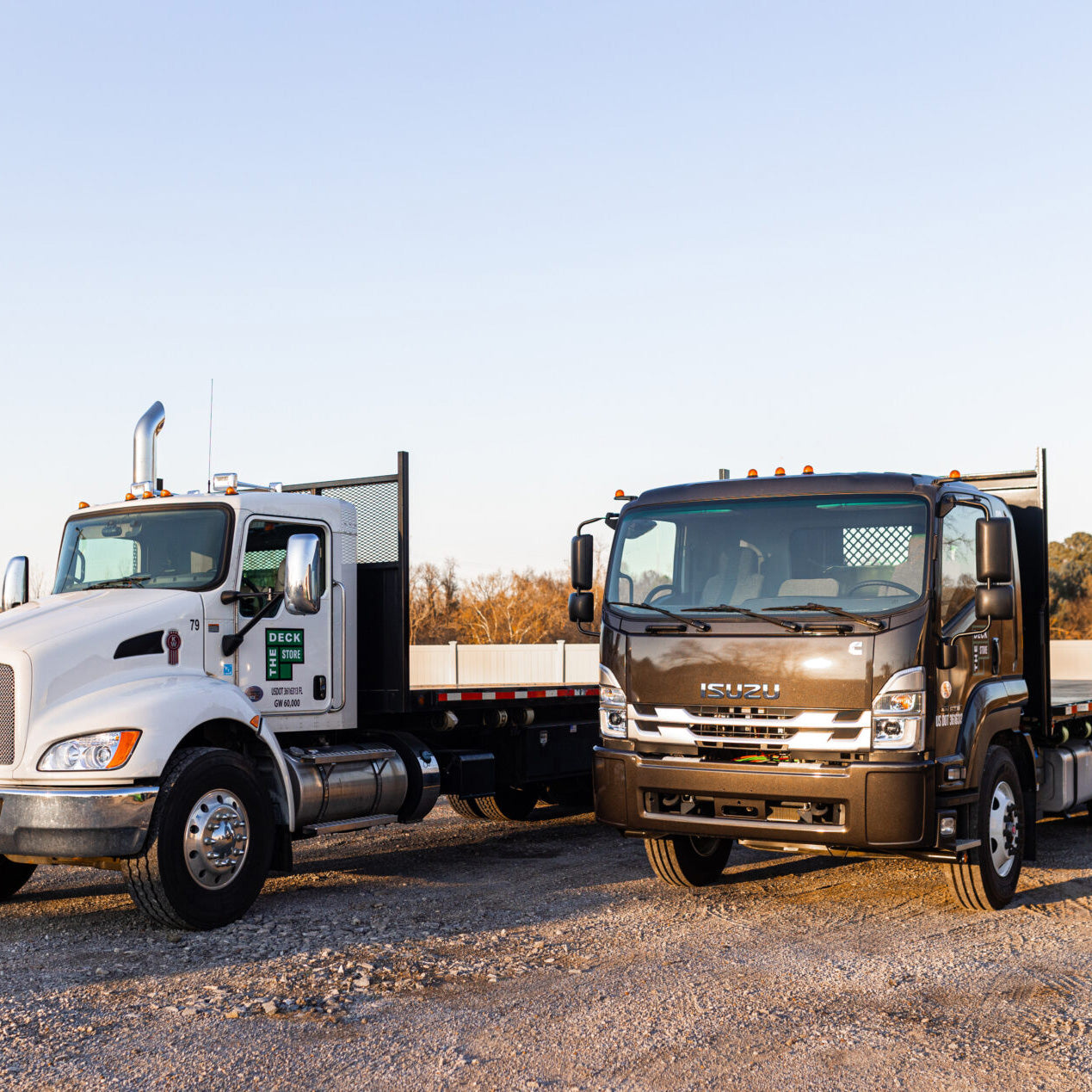 2 trucks standing next to each other