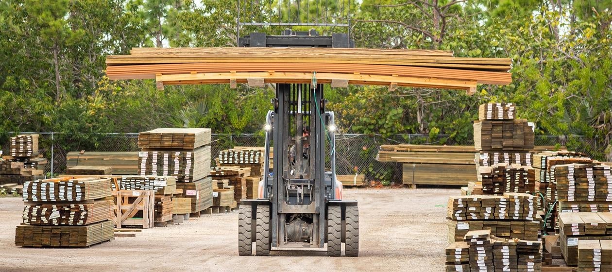 contractor moving decking materials 