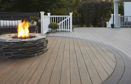 custom deck with a built in fire pit